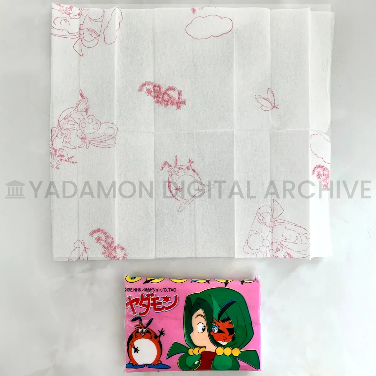 ヤダモン ポケットティッシュ。三昭紙業株式会社製造。Yadamon Tissue pack, manufactured by Sanshoshigyo Co., Ltd.